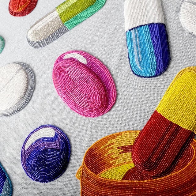 Jonathan Adler “Happy Pills” limited-edition beaded wall art, numbered 7 of 50 and dated May 2021. The piece features...