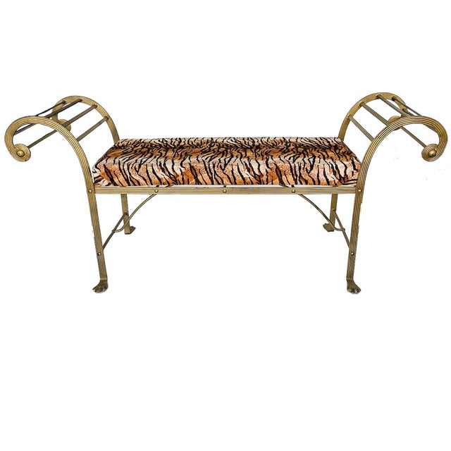 Add a dash of exotic drama to your interior with this striking Hollywood Regency-style bench. A masterful blend of...