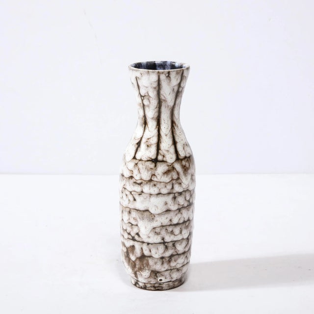 This Mid-Century Modernist Ceramic Vase With Banded Detailing is a beautiful example of Post War European Ceramics,...