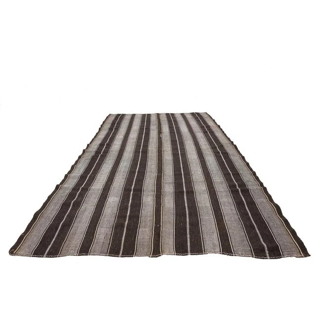 Vintage handwoven decorative kilim rug from Afyon region of Turkey. Approximately 50-60 years old. In very good condition.