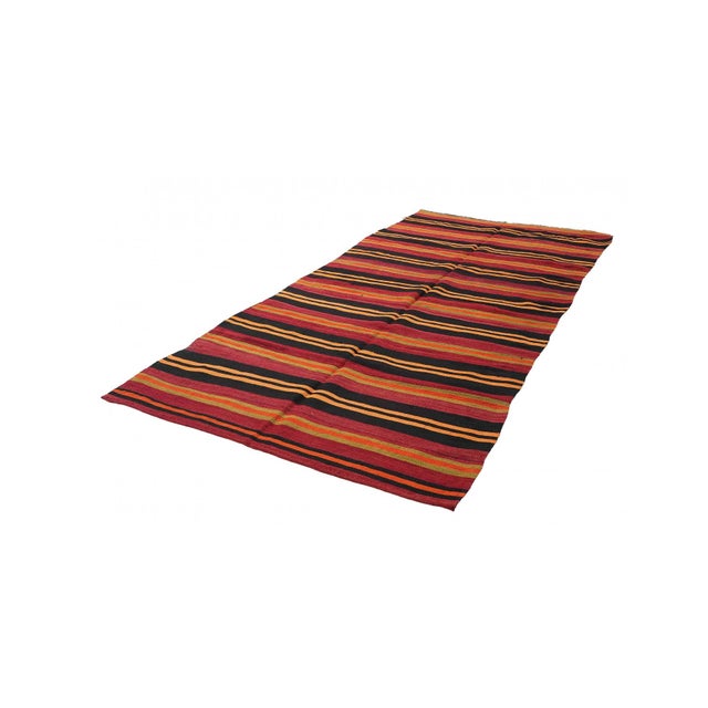 Handwoven vintage striped decorative kilim rug from Denizli region of Turkey. Approximately 50-60 years old. In very good...