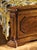 Handcrafted in Italy from solid walnut. This stunning bed features elegant walnut burl panels and hand-carved corbels that...