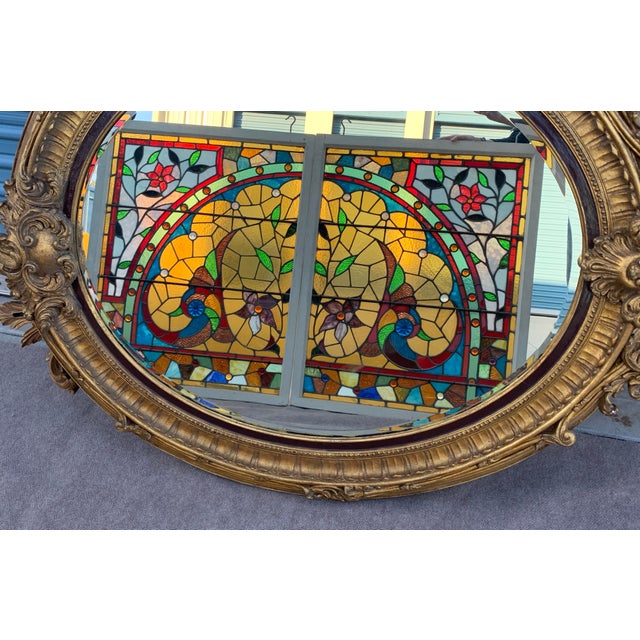 Stunning matching pair of antique stained glass window panels from the era of Queen Anne Victorians in Pittsburgh,...