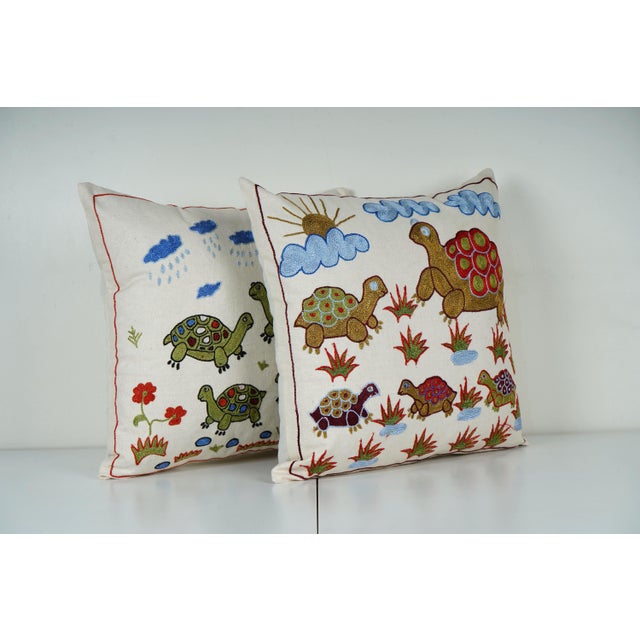 Uzbek Suzani Pillow Cover Elevate your home decor with our Turkish Suzani Pillow Cover, featuring exquisite vintage Uzbek...