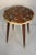 Mid-century modern Bespoke fossilized marble round side table. Tony Duquette-style.