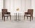 A stunning and rare set of four "Block Island" cane rush wicker dining chairs designed by John Hutton for Donghia in the...
