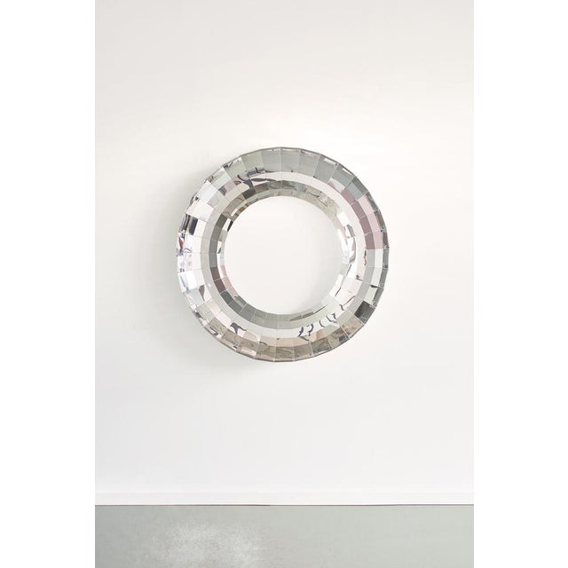 Tori circular wall mirror in aluminum by martens & visser. Dimensions: d 25 x w 130 x h 130 cm. Materials: aluminum....