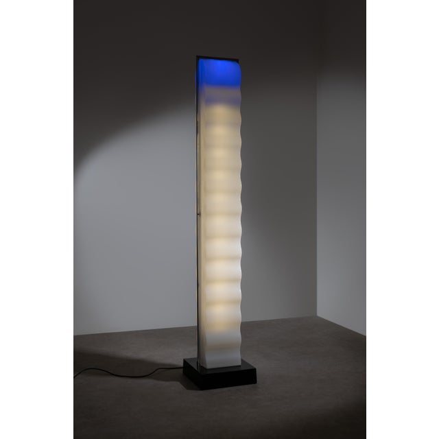 An iconic Cometa floor lamp designed by Ettore Sottsass, reflecting the designer’s unmistakable postmodern aesthetic....