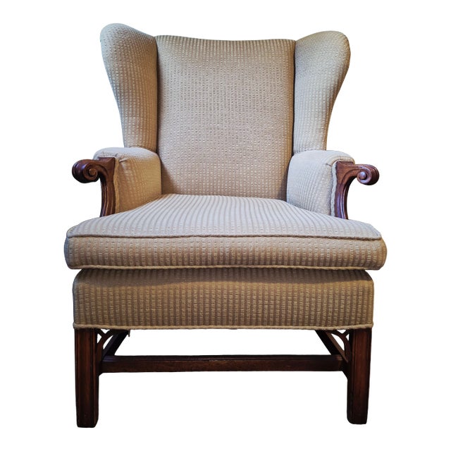 Antique Upholstered Wingback Armchair With Carved Wood Arms For Sale