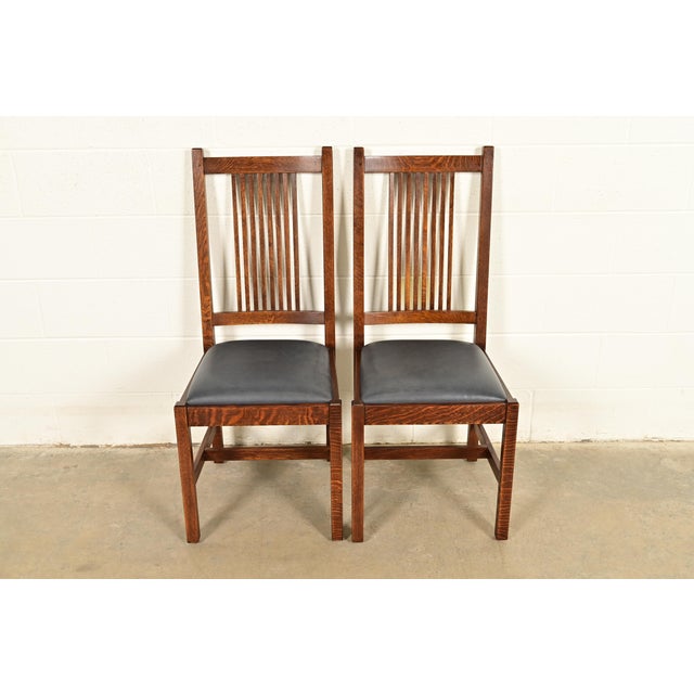 An exceptional pair of Mission or Arts & Crafts spindle back side chairs or dining chairs By L. & J.G. Stickley USA, Circa...