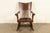 A rare and exceptional antique Mission or Arts & Crafts period rocking chair By J. Dieudonné Belgium, Circa 1910 Measures:...