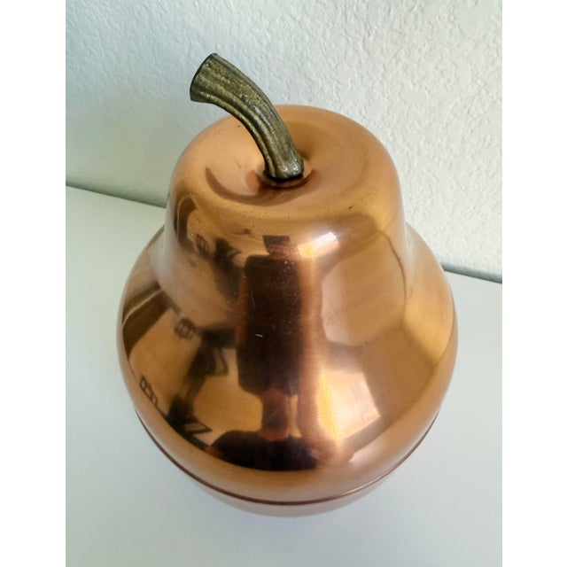 Whimsical large-scale pear ice bucket attributed to Raymor, produced in Italy circa 1970s. Features a spun aluminum shell...