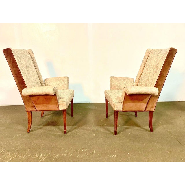 A beautiful pair of 1950's fireside chairs attributed to Lorin Jackson for Grosfeld House. The chairs are a wonderful...