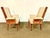 A beautiful pair of 1950's fireside chairs attributed to Lorin Jackson for Grosfeld House. The chairs are a wonderful...