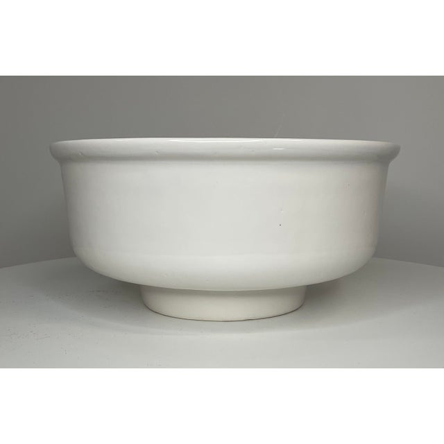 This bowl is special in its simplicity. The clean, elegant bowl has a pedestal base and the lip at the opening. Pedestal...