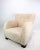 Danish cabinetmaker white coloured shearling - sheepskin 1940's lounge chair. A modern classic chair design with wide...