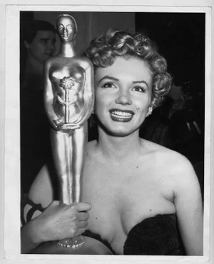 Actress Marilyn Monroe Wins a Trophy Photographed by Earl Leaf, 1952