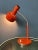 Hustadt leuchten pace age desk lamp in red / orange colour with flexible arm. The arm can be adjusted and also the shade...