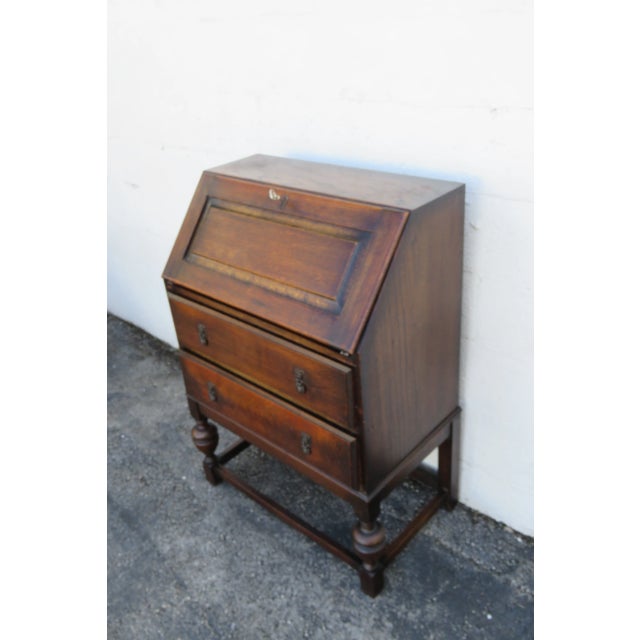 This Secretary Desk is made out of wood, solid wood, solid oak, and solid tiger oak. This Secretary Desk has a Traditional...