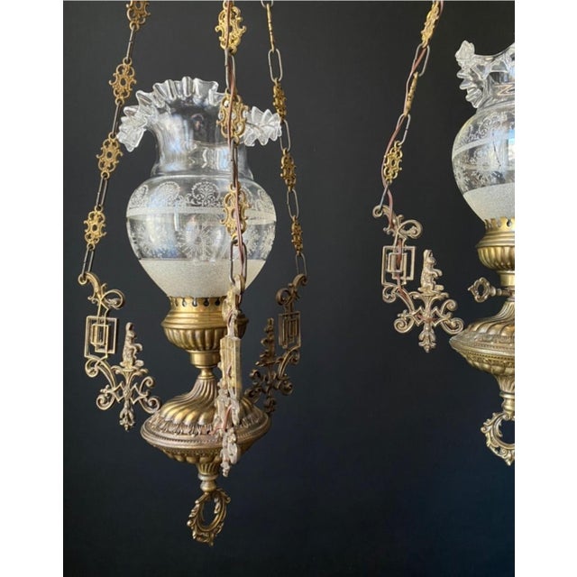 Beautiful antique chandeliers. italy, 20th century. the chandeliers are made of brass and bronze. A very beautiful piece...