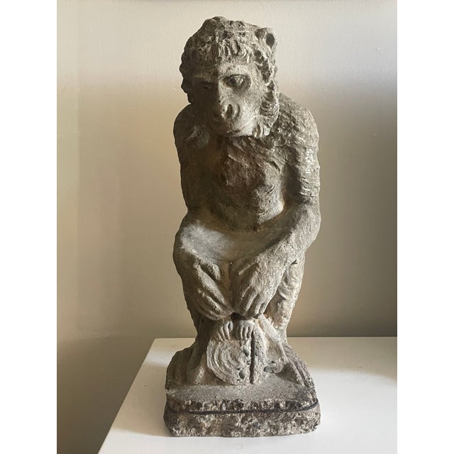 Charming and unusual pair of vintage French cast stone monkey statues, sourced from a garden outside Paris and purchased...