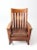 This is an early 20th century antique Mission style rocking chair. The craftsman armchair has a slat back and sides, and a...