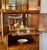 A beautifully crafted vintage Henredon campaign-style cabinet, thoughtfully designed as a full-service home bar and...