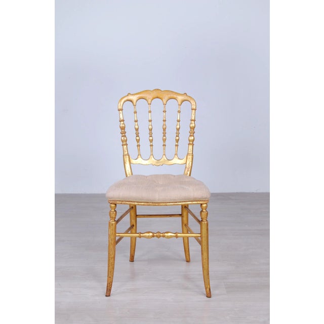 Beautiful Parisian style chiavarina chair. Wooden frame still well solid, gilded. Original production of the early 1900s...