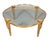 In the French taste with shaped circular top with inset thick glass with bronze reeded border. The square tapered fluted...