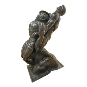 Bronze, "Pulling a Soldier to Safety", by Donald De Lue.