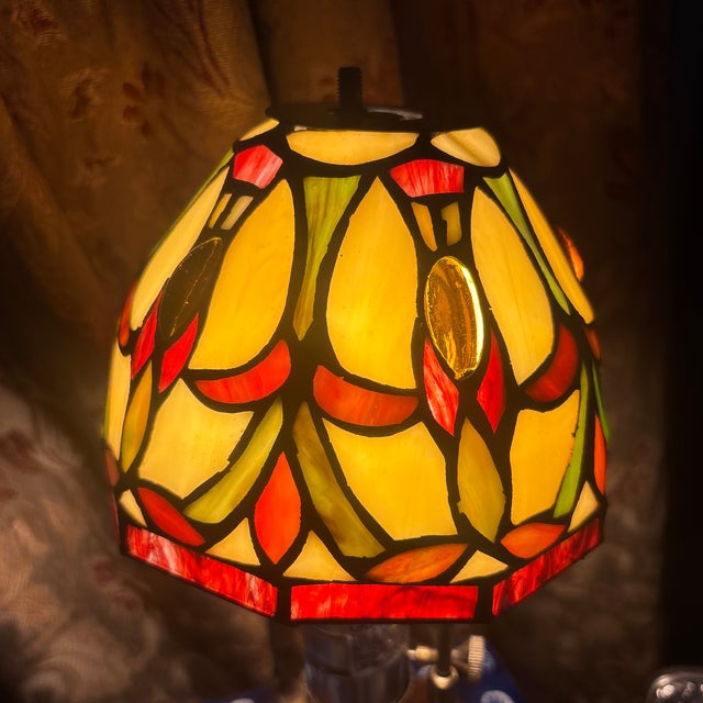 Four beautiful vintage Tiffany style glass lamp shades. These are lovely.