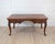 This elegant Louis XV style flat desk, crafted in the 20th century from solid walnut and elm, features a beautiful curved...