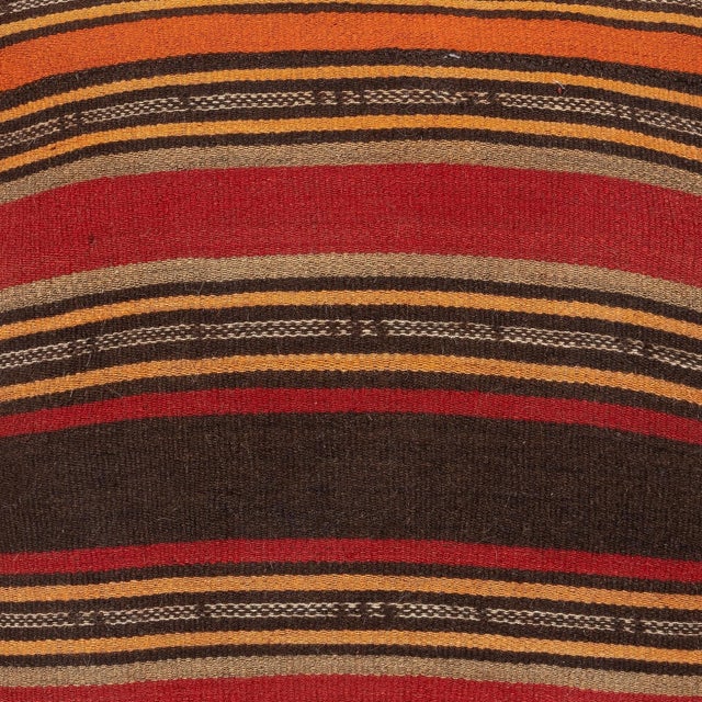 Add a touch of history and warmth to your space with this vintage handmade Turkish wool kilim cushion cover. Crafted from...