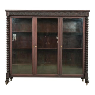 R. J. Horner Style American Empire Carved Mahogany Triple Bookcase With Lion Paw Feet, Circa 1890s For Sale