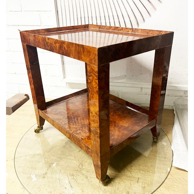 Designed after the Telephone “ Duchess” Table by Karl Springer, circa 1960.This modern and stylish version also has 2...