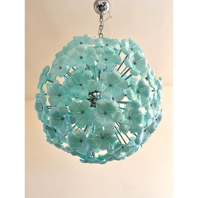 Contemporary Sputnik chandelier with green-wather lotus flowers blown in Murano glass. Hight italian craftamanship,...