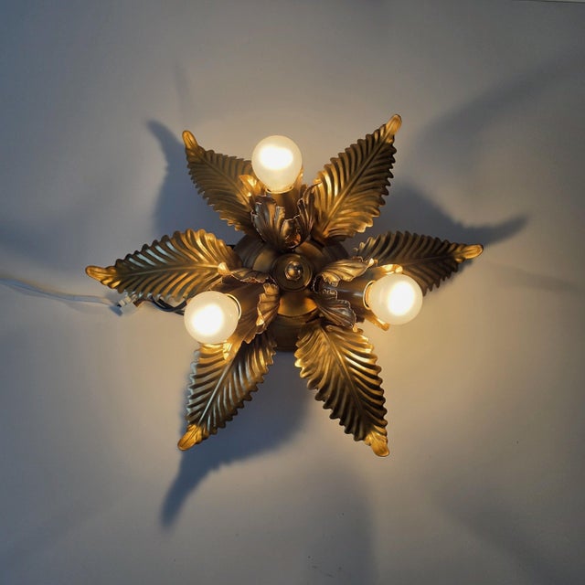 A beautiful gold-plated florentine-style wall or ceiling light by schröder & co., model no. 2928; (original nameplate on...