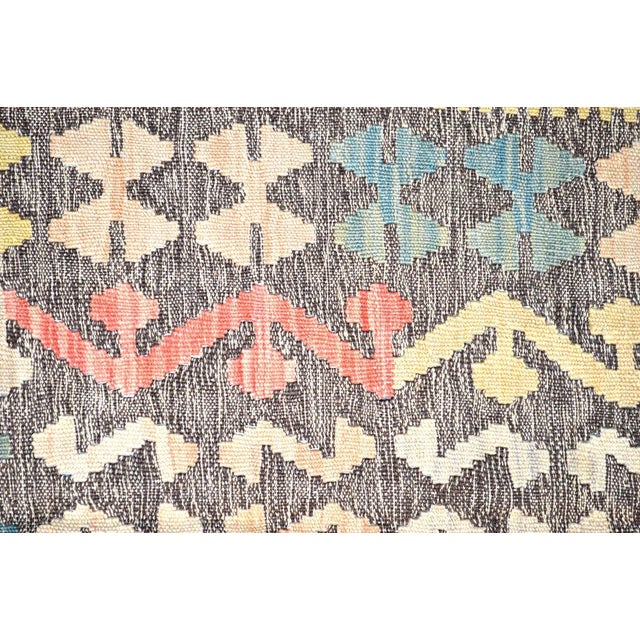 Flatweaved with care using traditional rug-making techniques, this wool rug blends timeless craftsmanship with a modern...