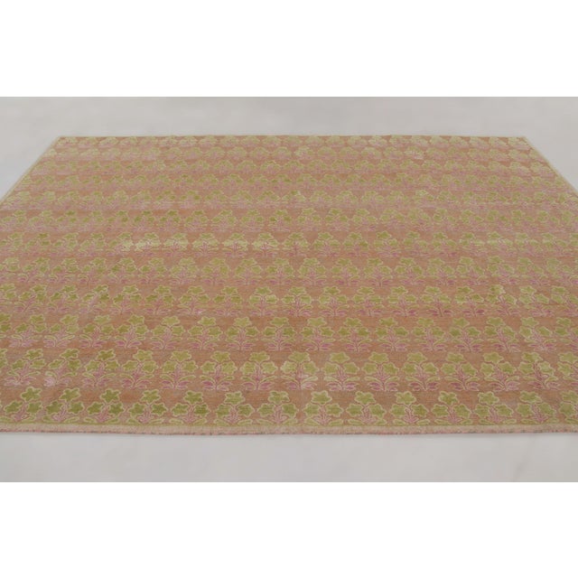 Hand-knotted in wool, this custom 9x11 contemporary rug joins Rug & Kilim’s Block Print collection. It presents an allover...