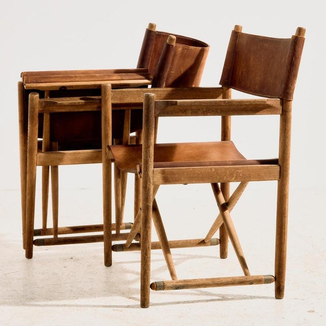 The ‘Model 903’ oak armchair, designed by Kurt Culetto for Horgen Glarus in the 1960s. The chairs are foldable, and the...