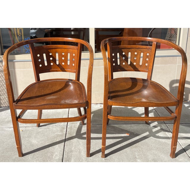 An exceptional, rare pair of early modernist Model No. 721 bentwood armchairs, originally envisioned by the pioneering...