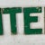 Wood Vintage Large "Enter" Sign on Masonite With Raised Letters in Green Paint For Sale - Image 7 of 9