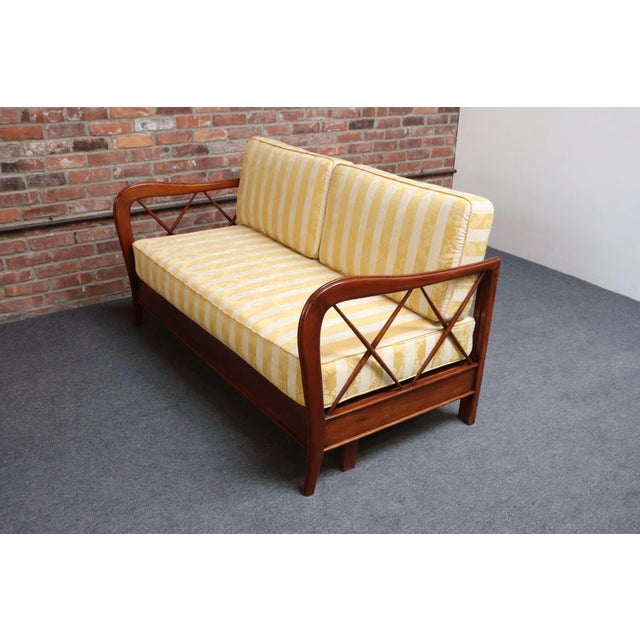 Sculptural sofa/divan bed/sofa bed attributed to Paolo Buffa (Italy, ca. late 1940s/early 1950s). Composed of a straight...