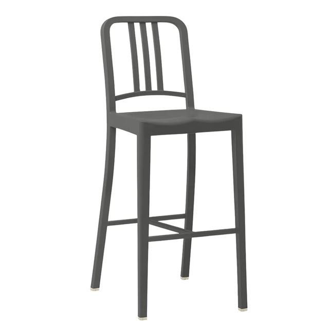 The Emeco 111 Bar Height Stool in Charcoal is a sleek and sustainable seating option made from 111 recycled bottles. With...