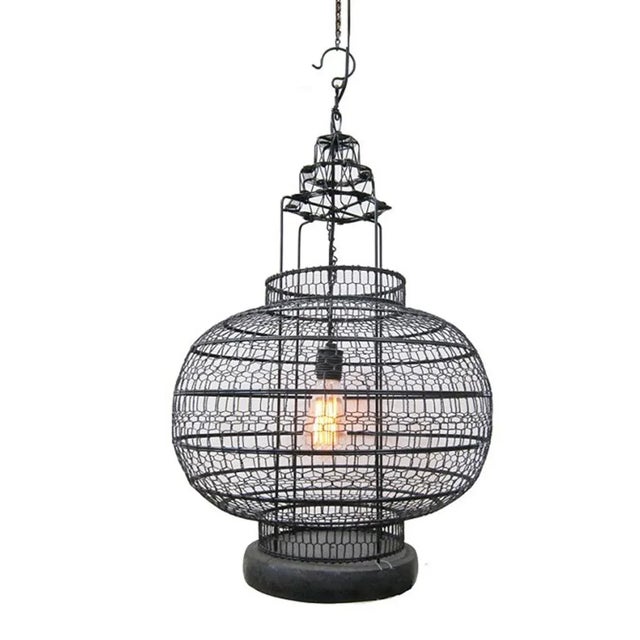 Original fishing boat lantern updated with intricate wire work and vintage Edison bulb. Each handmade and slightly unique....