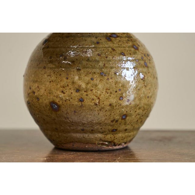 French Olive Green Glazed Studio Pottery Table Lamp with Rattan Shade, 1960s For Sale - Image 6 of 12