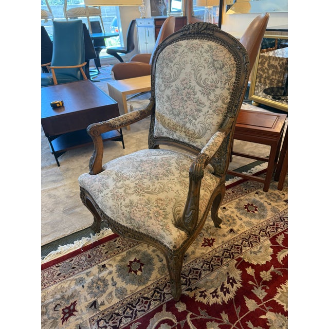 Design Plus Gallery presents a 19th Century Bergere Chair with a Floral Print Upholstery. This game room chair has had...