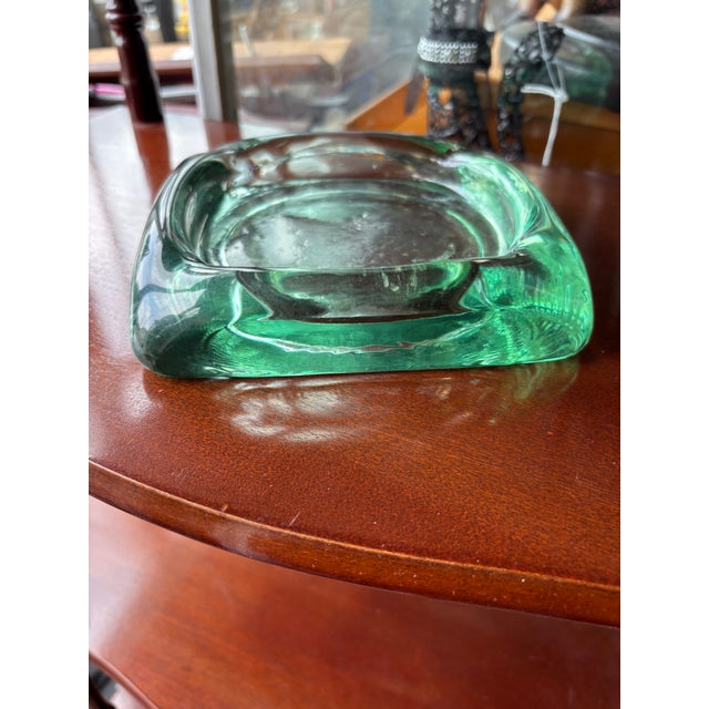 Thick Art Glass Cigar Ashtray in a Green Color comes in a Thick Glass Design .
