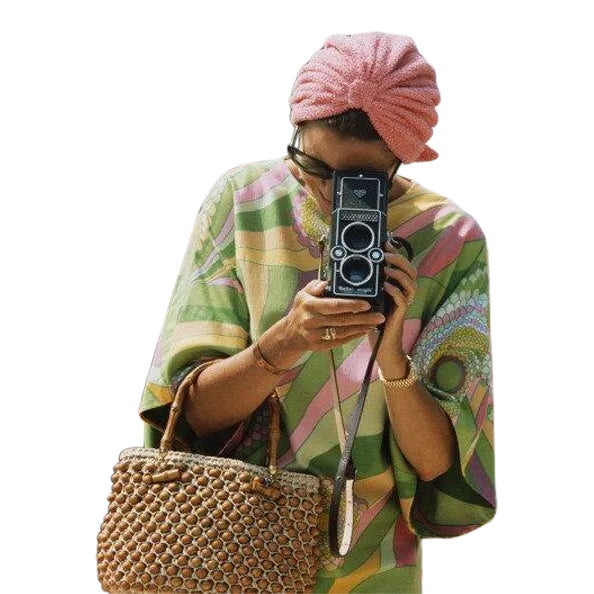 1972: Princess Grace of Monaco taking a photograph at a swimming competition at Palm Beach, Monte Carlo. (Photo by Hulton...
