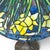 Metal Vintage Tiffany Style Leaded Stained Glass Daffodil Table Lamp With Bronzed Fluted Base For Sale - Image 7 of 14